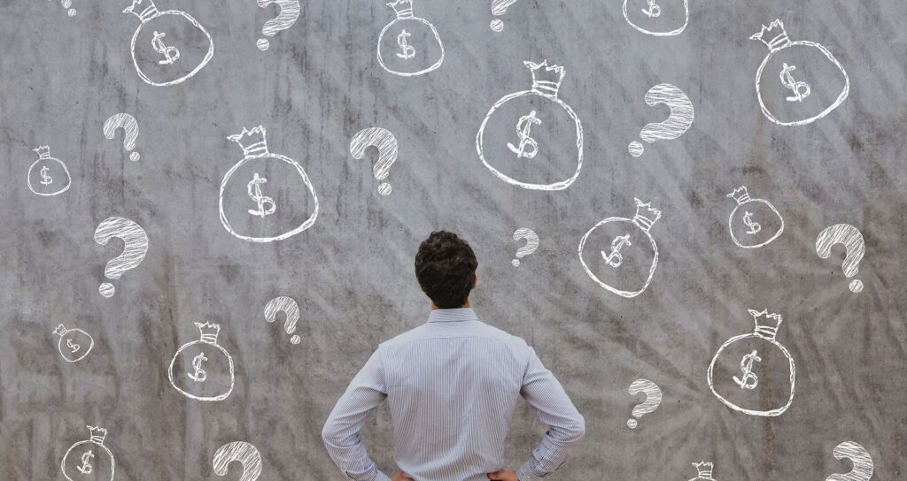 Man looking confused about money