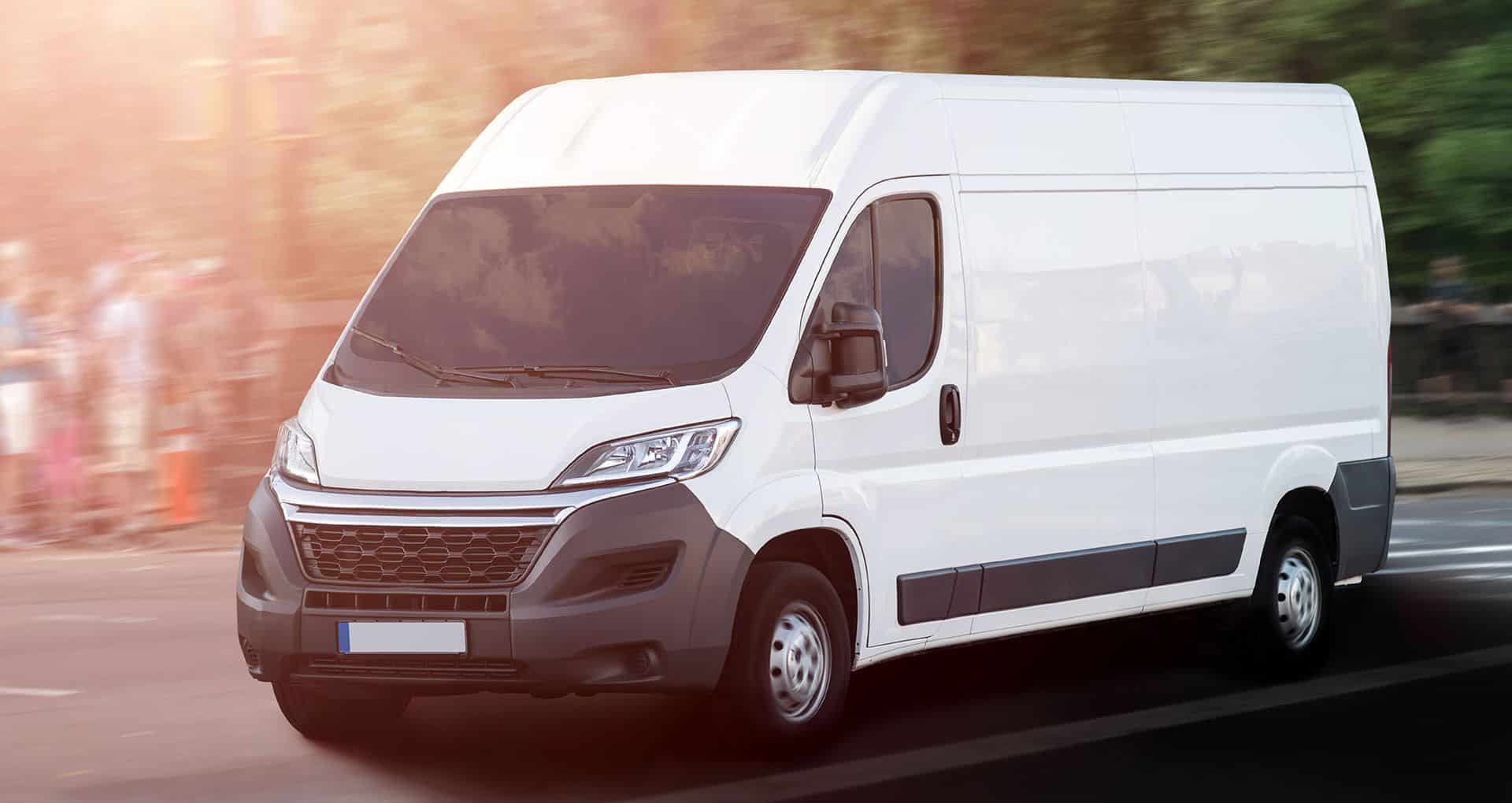 A large van driving down the road