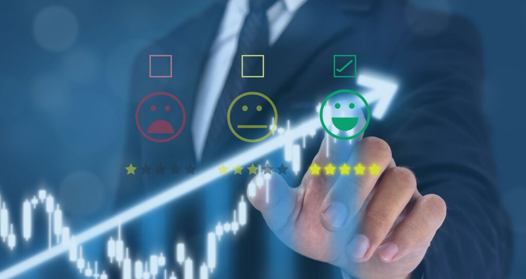 A man in a suit indicating the most positive option in a satisfaction survey